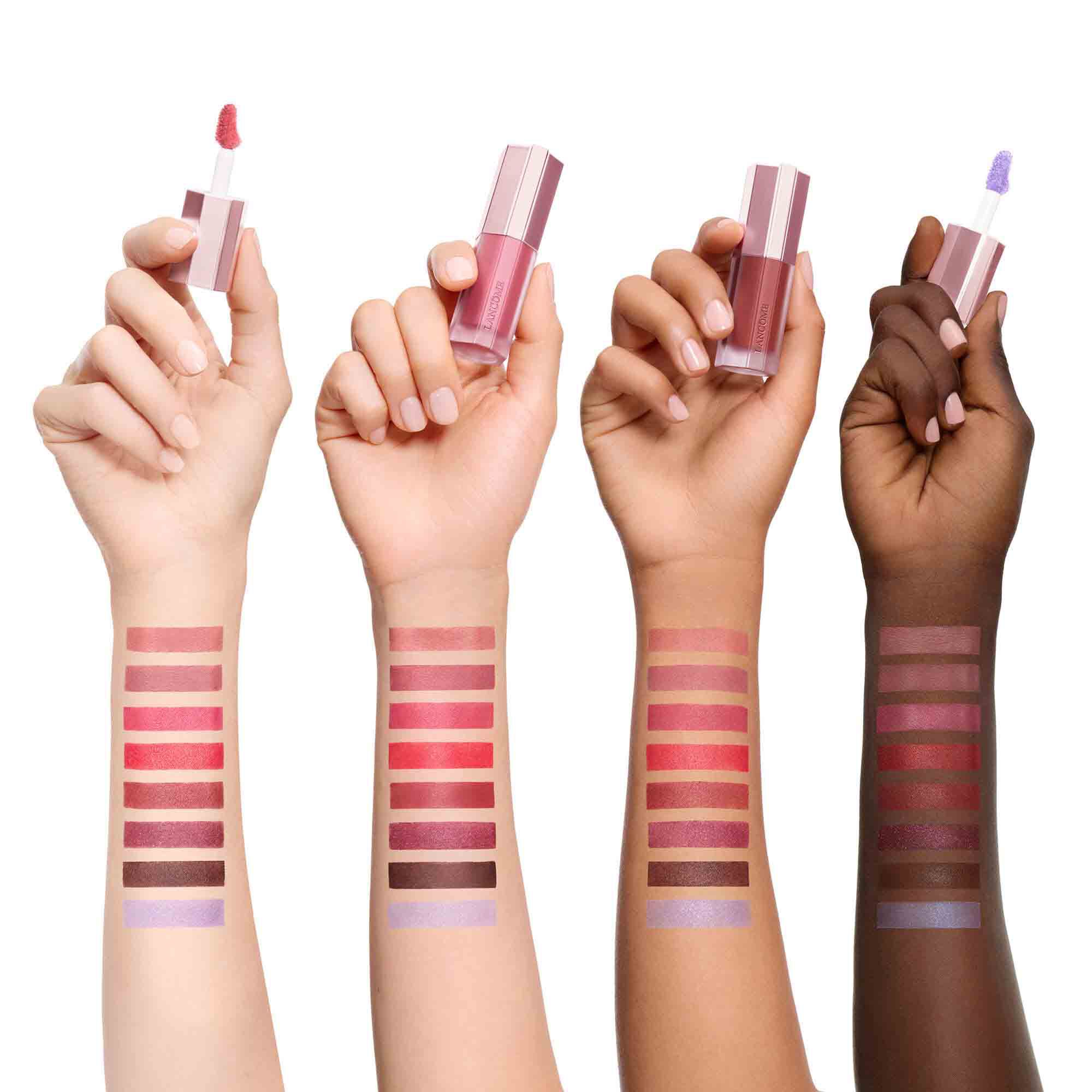 Color swatches of eight lip shades displayed on four different skin tones.