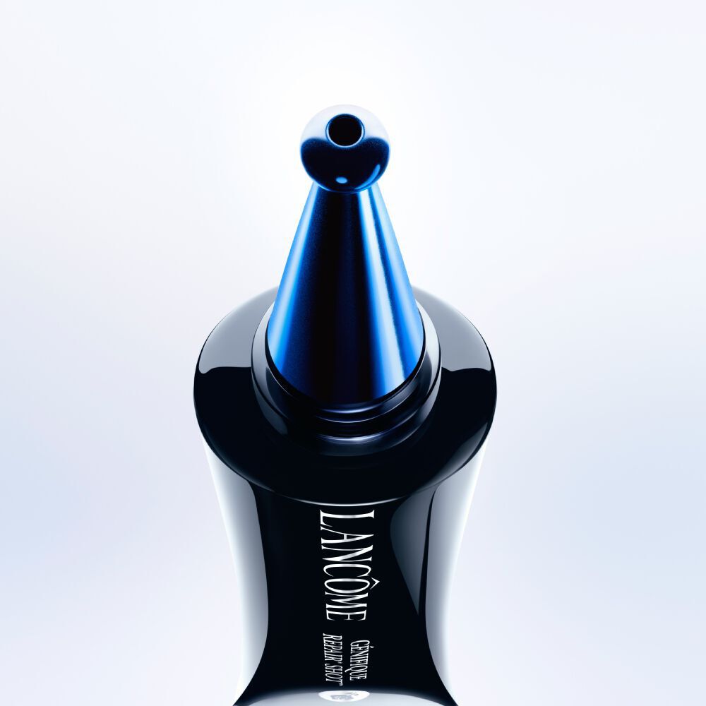 Close-up shot of the applicator of Genifique Repair Shot