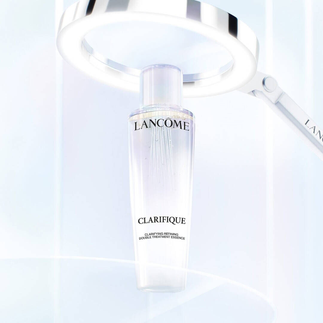 Clarifique Double Treatment Essence skincare bottle